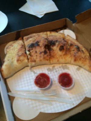 Calzone with almond ricotta cheese and vegan pepperoni  at Screamer's Pizzeria - Greenpoint in Brooklyn