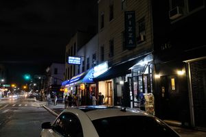 What the block looks like at night at Screamer's Pizzeria - Greenpoint in Brooklyn