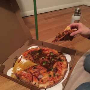 Half peppers and onions and half pepperoni and broccoli  at Screamer's Pizzeria - Greenpoint in Brooklyn