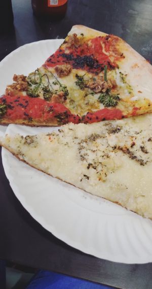 m m mmmm! one of the best vegan pizza spots  in nyc! the place itself is small, and dont have alot of tables but the employees are so nice and they work at a fast pace! i highly re at Screamer's Pizzeria - Greenpoint in Brooklyn