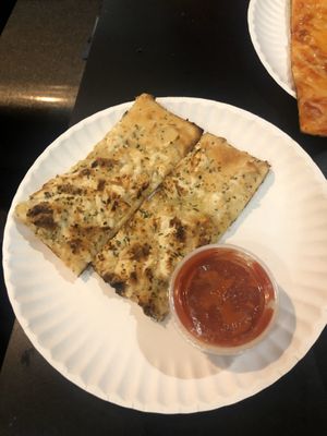 Cheesy strips with pizza sauce at Screamer's Pizzeria - Greenpoint in Brooklyn