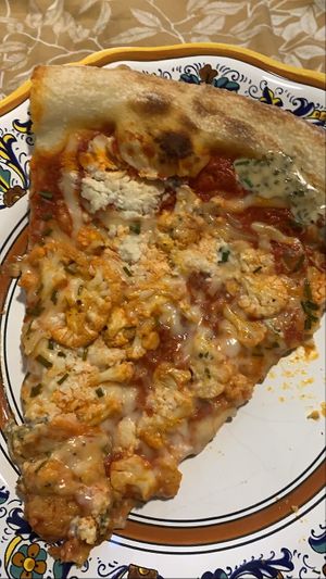 Delivery: Buffalo pizza - tomato sauce, vegan cheese, buffalo cauliflower, almond ricotta dollops, ranch drizzle, and chives.  at Screamer's Pizzeria - Greenpoint in Brooklyn