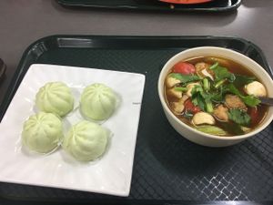 hot and spicy soup with lotus seed buns  at Blossoming Lotus in Haymarket