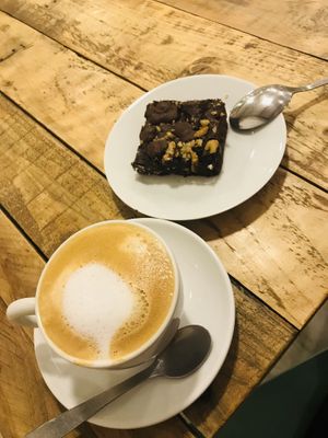 Brownie and coffee with rice milk at Xícara Tenda in Santiago De Compostela