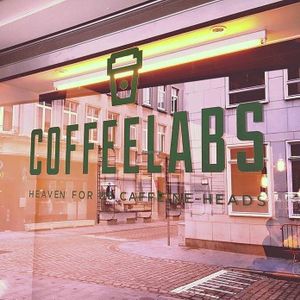 Front window with logo at Coffeelabs in Antwerpen