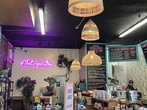 Cute inside with a vegan grocery section   at Glowing Plant Based Eatery in Los Angeles