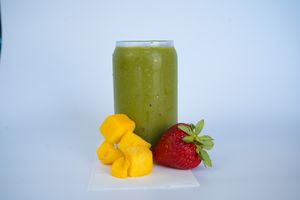 Kallisti Smoothie made from mango, strawberries, chard, dates, chia seeds, coconut water, aloe Vera, and burdock root at Glowing Plant Based Eatery in Los Angeles