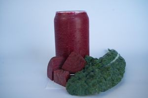 Green Devotion Smoothie made from beets, green apple, spinach, kale, dates, and chlorella at Glowing Plant Based Eatery in Los Angeles