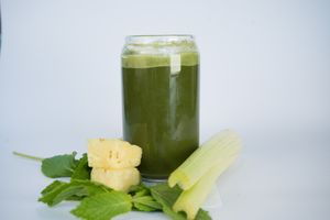 Metal Detox Juice made from cucumber, pineapple, celery, chard, cilantro, mint, lemon and reishi at Glowing Plant Based Eatery in Los Angeles