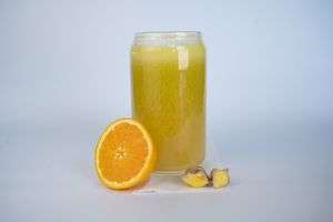 Sinus Juice made from apple, orange, lemon, ginger, cayenne, and wood betony at Glowing Plant Based Eatery in Los Angeles