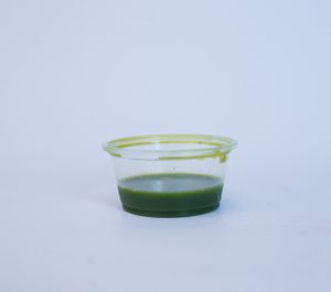 Wheatgrass wellness shot at Glowing Plant Based Eatery in Los Angeles