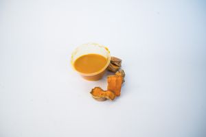 Turmeric wellness shot at Glowing Plant Based Eatery in Los Angeles