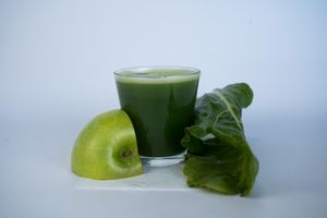 Green Healer tonic made from bok choy, chard, green apple, and wheatgrass at Glowing Plant Based Eatery in Los Angeles