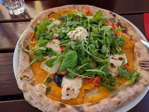 pizza with squash instead of tomato! at Vero Bio-Pizzeria in Vienna