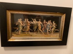 Among the abundance of art, this painting of the 9 muses adorns a bathroom at Iron Gate Cafe in Albany