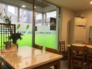 Clean and cheerful restaurant. Welcoming atmosphere. You will know when you have reached it because trees and plants - a mass of green - outside.  at Veg Green in Seoul