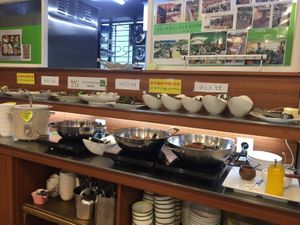 The buffet section. Many many choices. Don't forget you can make your own naengmyon, see the mustard bottle on the right.  at Veg Green in Seoul