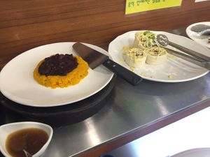 Pumpkin dish and some veggie rolls.  at Veg Green in Seoul
