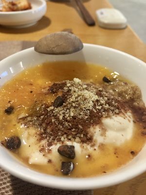 Dessert from the lotus leaf set (vegan yogurt topped with fruit purée, nuts and dark chocolate)  at Vegenarang in Busan