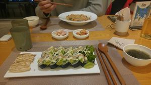 -  Spicy 'shrimp' noodles
- Avocado 'tuna' sushi 
- Korean sides at Vegenarang in Busan