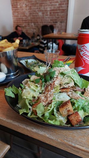 Caesar salad with a side of fries and asparagus at Meatless District - Da Costabuurt in Amsterdam