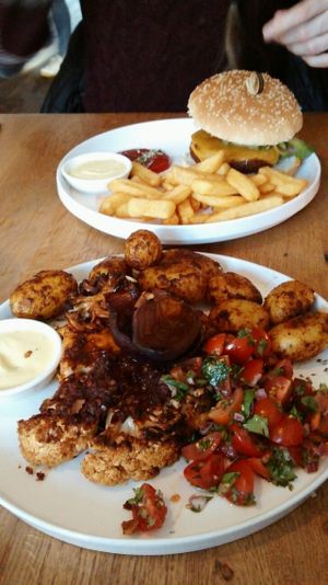 Cauliflower steak + cheeseburger at Meatless District at Meatless District - Da Costabuurt in Amsterdam