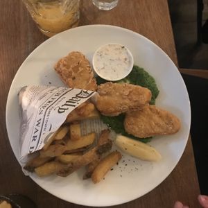 The “Fish and Chips”: just three defrosted Gardein fish filets, some french fries, and mashed peas at Meatless District - Da Costabuurt in Amsterdam