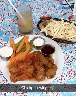 Chickpea buffalo wings with mumbo sauce, fries and wht sangria   at Sticky Fingers Diner in Washington