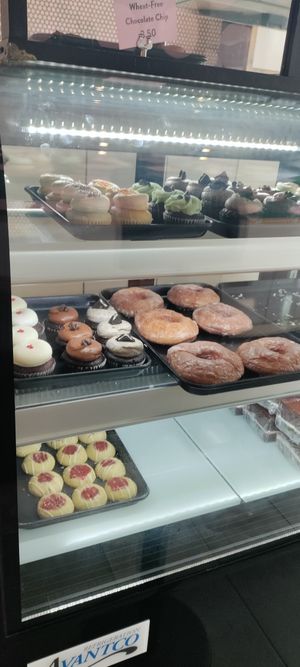 Bakery case with cupcakes and donuts at Sticky Fingers Diner in Washington