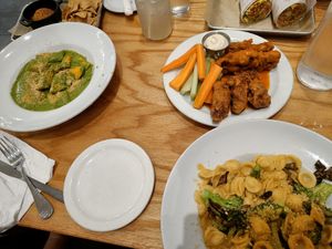 Macncheese right bottom, buffalo wings, filled pasta and more at Sticky Fingers Diner in Washington