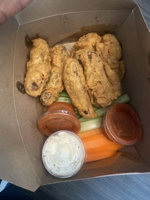 Wings with Buffalo sauce   at Sticky Fingers Diner in Washington