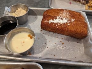 French toast sticks (weekend only) with cream cheese dip, maple syrup, and cinnamon veg butter at Sticky Fingers Diner in Washington