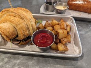 Croissant sandwich with home fries-- meh at Sticky Fingers Diner in Washington