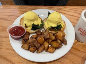 Benedict Florentine with roast potatoes  at Sticky Fingers Diner in Washington