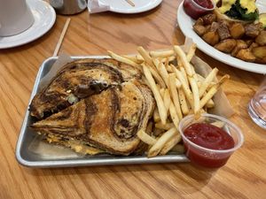 Reuben on marble rye with french fries  at Sticky Fingers Diner in Washington