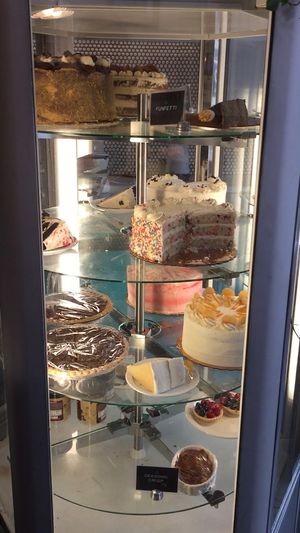 Cake display case is truly mesmerizing  at Sticky Fingers Diner in Washington