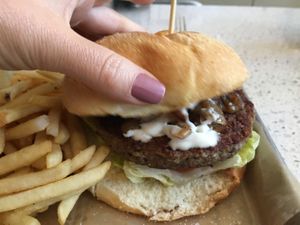 Impossible burger with caramelised onions  at Sticky Fingers Diner in Washington
