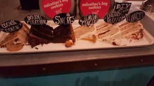 Cake choices on display: Cookie Dough, Double Chocolate S'mores, Lemon Ginger, Cherry Blossom & Funfetti at Sticky Fingers Diner in Washington