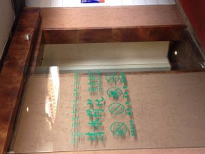 Signs in the hallway at A Lotus on the Water in Tibet