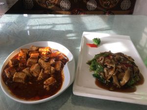 mapo dofu; mushroom and brocoli stirfry at A Lotus on the Water in Tibet