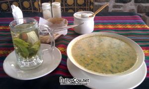 Quinoa soup with greens and coca tea at Sattva by Govinda in Aguas Calientes