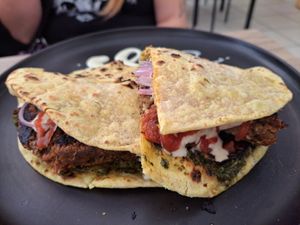 Hamburguesa de lentejas en chapati $25.90 soles at Sattva by Govinda in Aguas Calientes