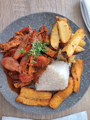 Lomo saltado con platano frito at Sattva by Govinda in Aguas Calientes