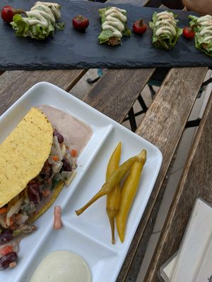 Taco filled with beans and veg and served with pickled chilli and mayonnaise at Bistraw Zdravo Zivo in Skopje