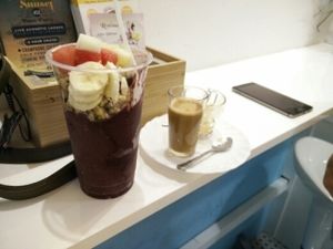 mango acai (delicious) and coffe with vegan mylk at FitBar - Barceloneta in Barcelona
