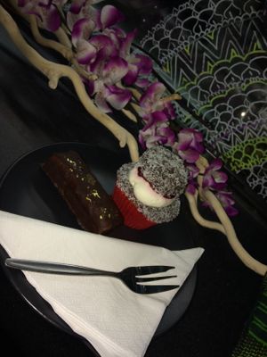 Vegan lamington cupcake and a raw smackers bar. at Cheeky Yam in Cairns