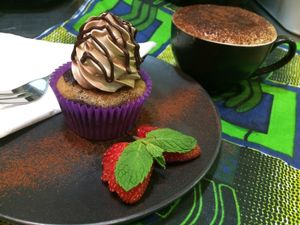 Vegan White and dark ganache cupcake with a cappuccino at Cheeky Yam in Cairns