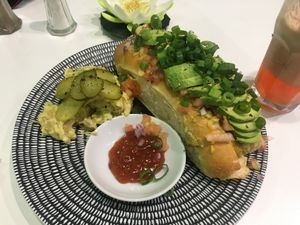 Vegan hot dog with avo and potato salad - yum! at Cheeky Yam in Cairns