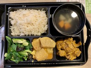 Bento sesame rice with vegetables,rendang,curry potatoes .  In general nice food . at Greendot 绿一点 - Nex in Northeast Singapore