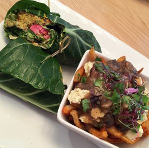 Falafel wrapped in collard greens and vegan poutine. at Pure Kitchen - Elgin in Ottawa